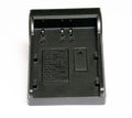 Interchangeable battery plate adapter, black with labeled battery contacts and clips