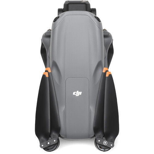 Air 3S drone rear view with backpack-style shell, gray body and orange accent marks.