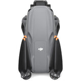 Air 3S drone rear view with backpack-style shell, gray body and orange accent marks.