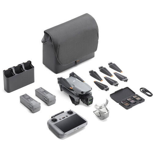 Fly More Combo case and accessories: gray storage pouch, batteries, cables, and blades.