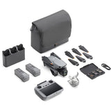 Fly More Combo case and accessories: gray storage pouch, batteries, cables, and blades.