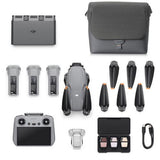 Air 3S Fly More kit laid out: controller, extra batteries, propellers, charger case, cables.