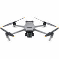Foldable quadcopter drone with 3-axis gimbal and four propellers, light gray body