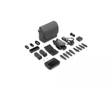 Mavic 3 Pro combo components laid out: drone, case, batteries, remote, and propellers