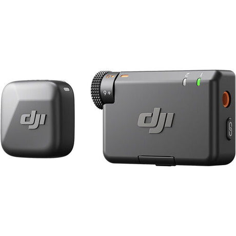 Wireless mic receiver and transmitter, compact black/gray units with logos