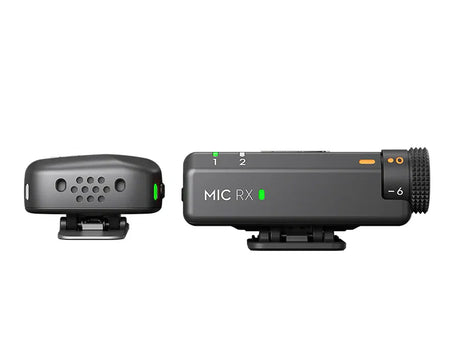 Wireless mic receiver with speaker grille and clip, transmitter shows MIC RX screen
