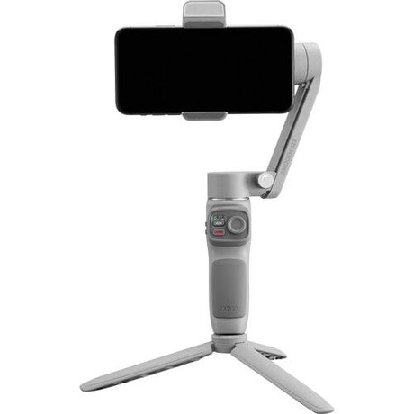 Smooth Q3 gimbal stabilizer on tripod stand with phone mount, front view