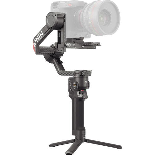 DJI RS 4 Pro gimbal stabilizer with long lens, top plate, and tripod legs
