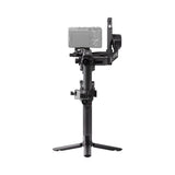 Black gimbal stabilizer with camera mount and counterweight arm with tripod base