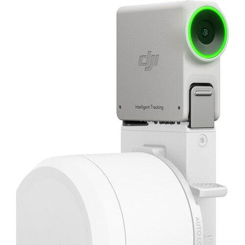 Intelligent Tracking Module with green status ring and camera lens on silver body