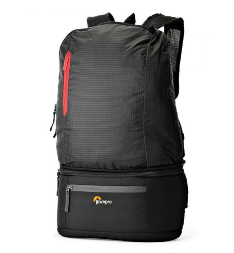 Convertible backpack with front pocket and red zipper accent, black/charcoal fabric