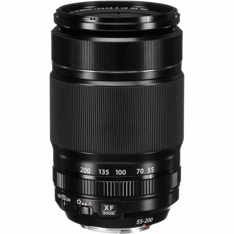 Black 55-200mm camera lens showing zoom control switches and focal length markings