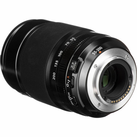 Side view of black 55-200mm zoom camera lens with control switch and mount opening