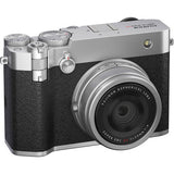 Silver compact medium-format camera with black textured grip and front lens