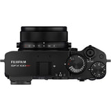 Aparat foto compact negru din lateral cu cadran de control și partea superioară