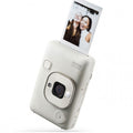 Misty white Instax mini LiPlay instant camera with photo display at top