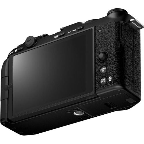 Black mirrorless camera with rear LCD screen, side view