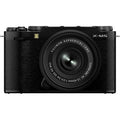 Black mirrorless camera with attached lens, front view