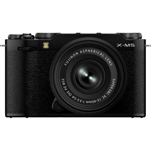 Black mirrorless camera with attached lens, front view