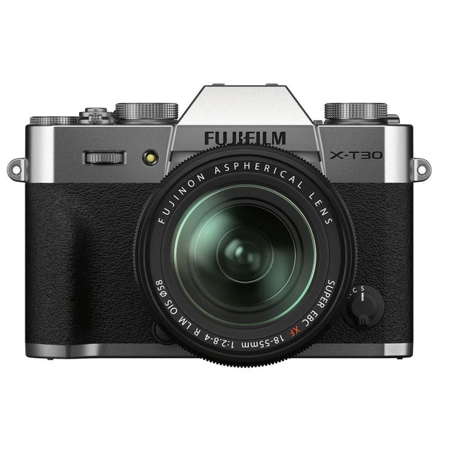 Mirrorless camera with 18-55mm lens, black body and silver top dials
