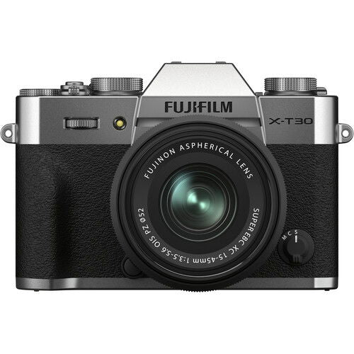 Front view mirrorless camera with 15-45mm lens; silver top and black body