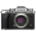 Mirrorless camera body with lens, textured grip, and top control panel