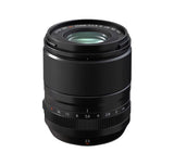Black 23mm f/1.4 lens, front glass and ridged focus ring visible