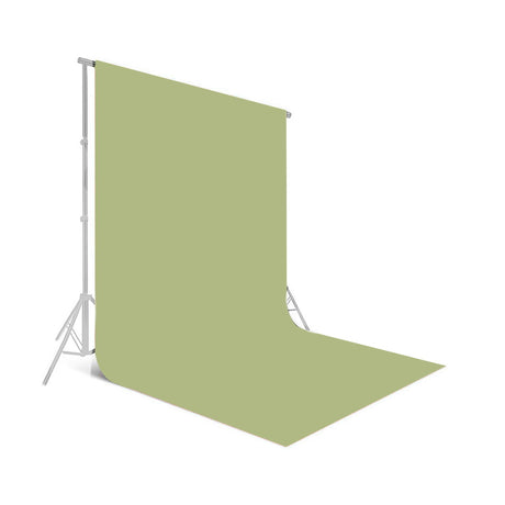 Green seamless photo backdrop with backdrop stand and backdrop sheet draped down