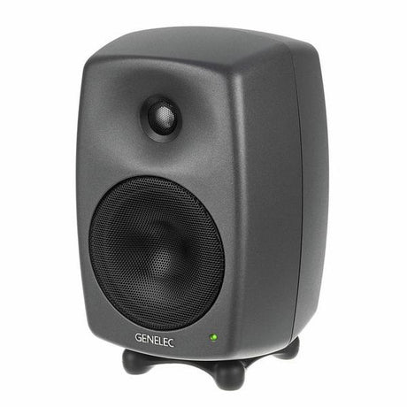 Dark gray active studio monitor speaker with tweeter and woofer, front view