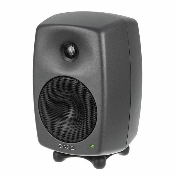 Dark gray active studio monitor speaker with tweeter and woofer, front view