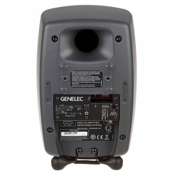 Dark gray active studio monitor speaker rear panel with ports and controls