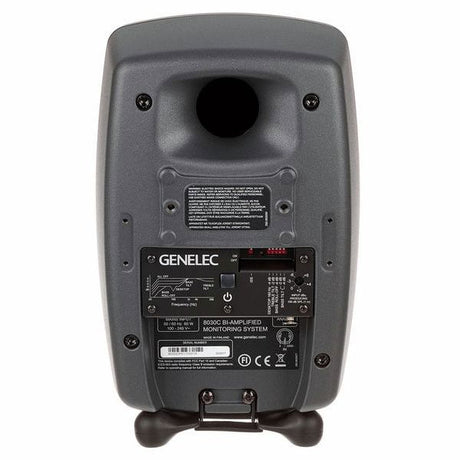 Dark gray active studio monitor speaker rear panel with ports and controls