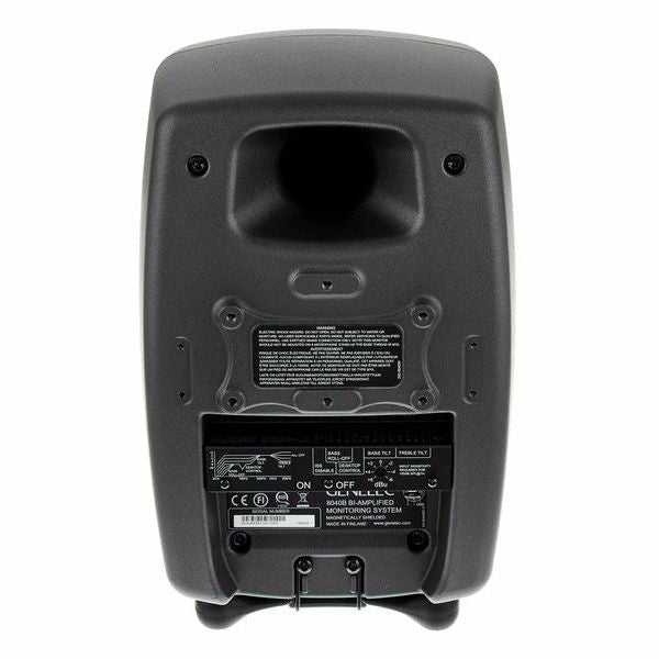 Active studio monitor back panel with connectors, label, and mounting feet, dark gray