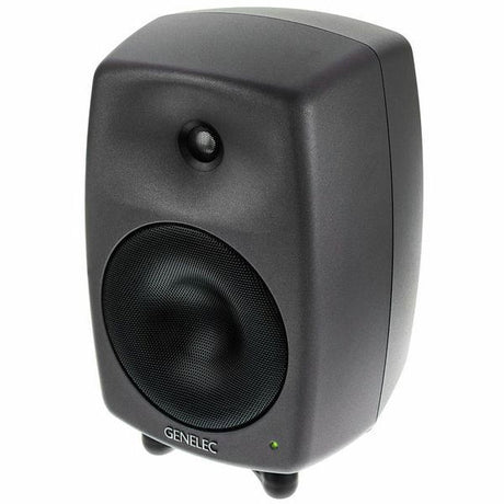 Active studio monitor speaker with tweeter and woofer, dark gray front view