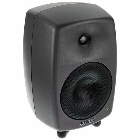 Active studio monitor speaker, angled front view with tweeter, dark gray cabinet
