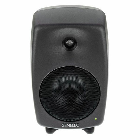Active studio monitor speaker, tweeter and large woofer grille close-up, dark gray