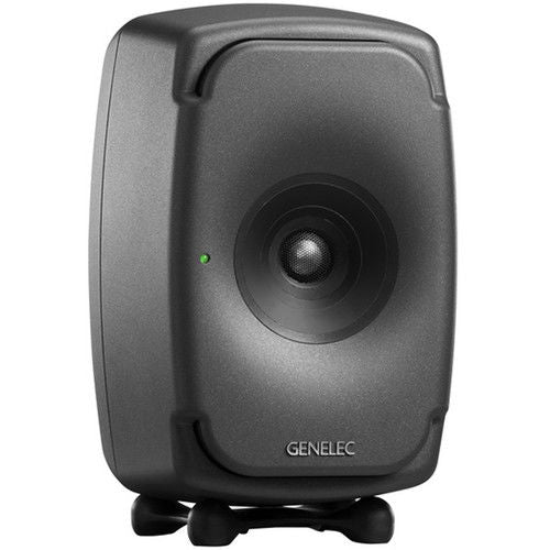 Dark gray active studio monitor speaker with front woofer and small green status light