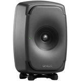 Dark gray active studio monitor speaker with front woofer and small green status light