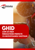 Ghid digital online: microfon shotgun portocaliu cu paravânt pufos, prim-plan