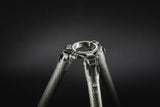 Tripod top with center hub and carbon-fiber legs, dark grey/black