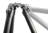 Tripod head with adjustment knobs and carbon-fiber legs, angled view, black