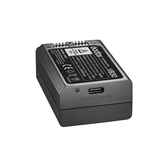 Acumulator Godox VB30 pentru blit, carcasă gri închis, port USB‑C și etichete