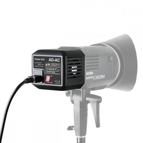 AD-AC power unit for AD600 flash showing rear panel with label and cooling vents