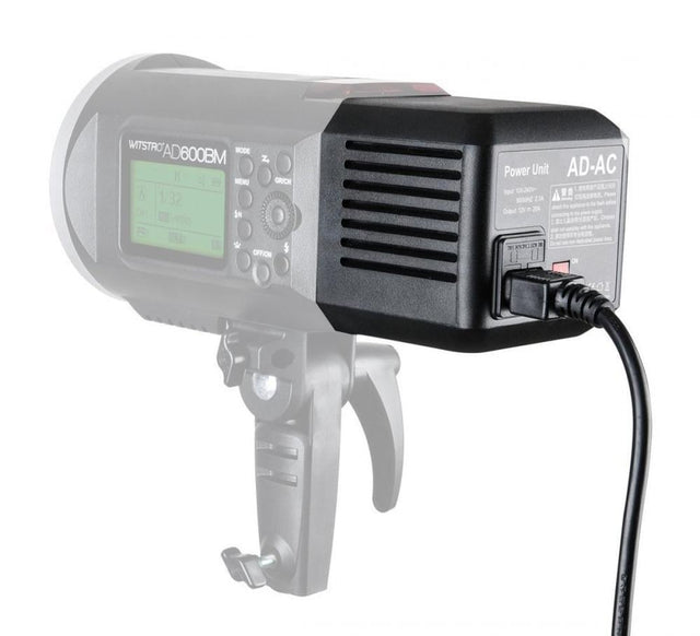 AD-AC power unit for AD600 flash with LCD display, control buttons, and vents
