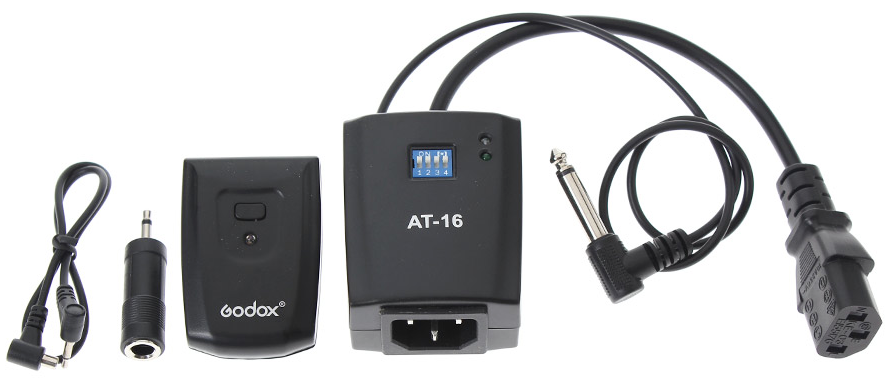 AT-16 flash declansator kit with two units, cables, and sync connector