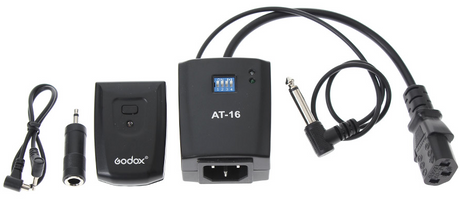AT-16 flash declansator kit with two units, cables, and sync connector