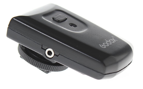 AT-16 unit with LCD display and power button, side view