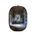 Foldable oval photo backdrop with worn hallway print, arched edges
