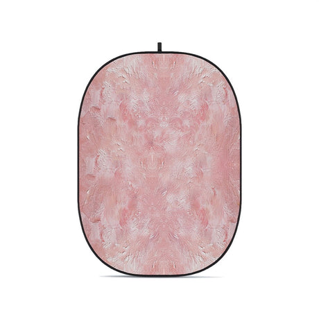 Pink textured oval foldable backdrop with black border and top hanging loop.