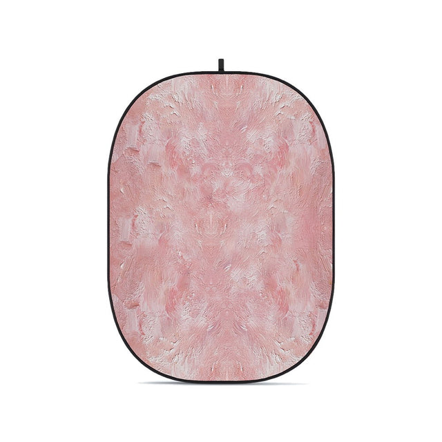 Pink textured oval foldable backdrop with black border and top hanging loop.